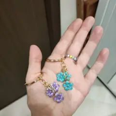 Customer photo of Sakura Flower Keychain — Cute Enamel Bag Charm Accessory