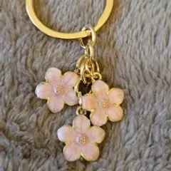 Customer photo of Sakura Flower Keychain — Cute Enamel Bag Charm Accessory