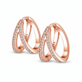 Two rose gold hoop earrings with small diamonds on a white background